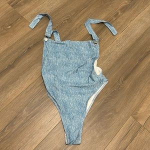 One piece swim suit.